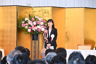 写真：秋田県知事の祝辞（秋田地域振興局長代読）